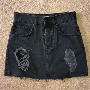 Distressed jean mini skirt